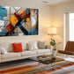 a living room filled with furniture and a painting on the wall