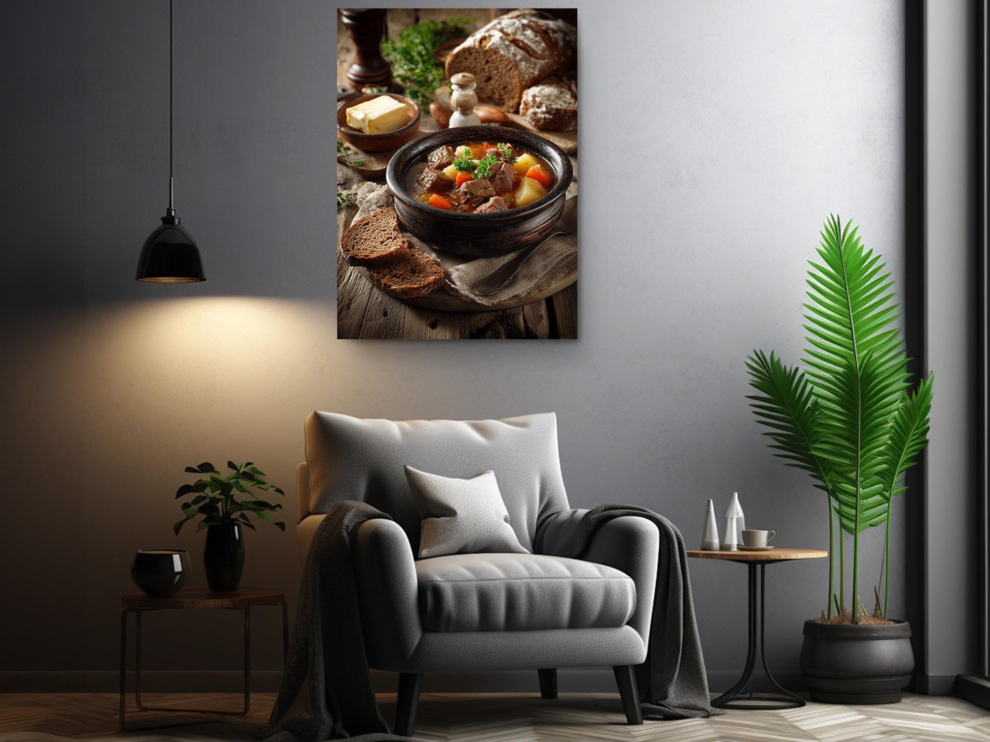 a cozy living room with a comfortable gray armchair, a wooden side table, and a potted plant. Above the armchair, there is a framed photograph of a hearty stew with bread and vegetables, creating a warm and inviting atmosphere.