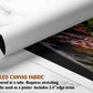 The image is a rolled canvas fabric, which is a type of canvas material used for printing photographs or artwork. It is described as a tube-delivered fabric, which means it is delivered in a tube and requires stretching before use. The fabric can be used as a poster, with a 2.5" edge area.