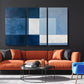 a living room with a couch and two chairs