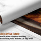 The image is a rolled canvas fabric, which is a type of canvas material used for creating posters or wall art. It is described as a tube-delivered fabric, which means it is delivered in a tube and requires stretching before use. The fabric can be used as a poster and includes a 2.5" edge area.