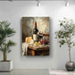 a painting of a table with a bottle of wine, cheese, and grapes, surrounded by potted plants.