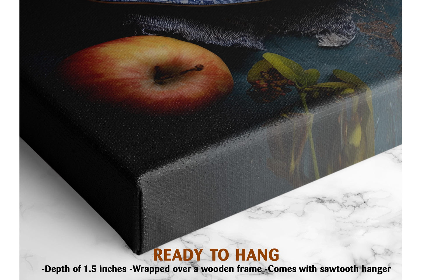 The image is a close-up of a black canvas print featuring a vibrant red apple and a green plant, with a text overlay that reads "READY TO HANG" and provides the dimensions of the print as "-1.5 inches" and "wrapped over a wooden frame."