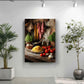 a kitchen scene with various food items, including a bowl of noodles, tomatoes, garlic, and herbs, displayed on a wooden table. The kitchen is decorated with potted plants and a painting hanging on the wall.