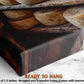The image is a close-up of wooden planks or planks of wood, possibly used for construction or other purposes. The planks are arranged in a way that they appear to be hanging on a wall or a wooden frame. The image does not contain any text or other discernible objects or actions.