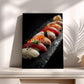 A framed photograph of a variety of sushi rolls on a black plate, displayed on a white shelf.