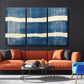 a living room with a couch and two chairs