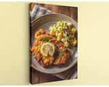 A plate of food, including a piece of fried meat and a side of potato salad, is presented on a wooden surface.