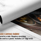 The image is a rolled canvas fabric, which is a type of canvas material used for creating posters or wall art. It is described as a tube-delivered fabric, which means it is delivered in a tube and requires stretching before use. The fabric can be used as a poster and includes a 2.5" edge area.
