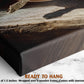 The image is a close-up of a wooden frame with a wooden surface, and it appears to be a canvas print or wall art.