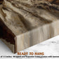 The image is a close-up of a textured fabric, possibly a piece of clothing or a textile, with a wooden frame. The text "READY TO HANG" is visible, indicating that the fabric is ready to be hung up.