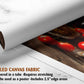 The image is a rolled canvas fabric, which is a type of canvas material used for creating posters or wall art. It is described as a tube-delivered fabric, which means it is delivered in a tube and requires stretching before use. The fabric can be used as a poster and includes a 2.5" edge area.
