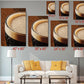 a living room with a white couch and a coffee table. Above the couch, there are six framed images of beer glasses, each with a different size and perspective, ranging from 8" x 12" to 24" x 36". The images are arranged in a grid-like pattern on the wall, with each one depicting a different view of a glass of beer.