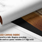 The image is a rolled canvas fabric, which is a type of canvas material used for creating posters, wall art, or other printed materials. It is delivered in a tube and requires stretching before use. The fabric can be used as a poster with a 2.5" edge area.