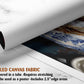 The image is a rolled canvas fabric, which is a type of canvas material used for painting or printing. It is described as a tube-delivered fabric that requires stretching and can be used as a poster with a 2.5" edge area.