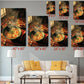The image is a living room with a white couch and a coffee table. Above the couch, there are six framed images of various sizes, each depicting different scenes related to food, such as bowls of soup and plates of food. The images are arranged in a grid-like pattern on the wall, creating a visually appealing display.