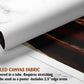 The image is a rolled canvas fabric, which is a type of canvas material used for creating posters or wall art. It is delivered in a tube and requires stretching before use. The fabric can be used as a poster and includes a 2.5" edge area.
