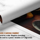 The image is a rolled canvas fabric, which is a type of canvas material used for creating posters or wall art. It is described as a tube-delivered fabric, which means it is delivered in a tube and requires stretching before use. The fabric can be used as a poster with a 2.5" edge area.